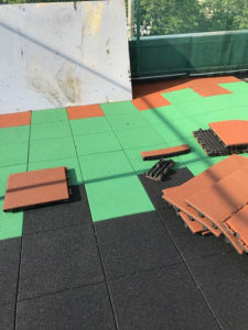 Installing rubber tiles for playgrounds