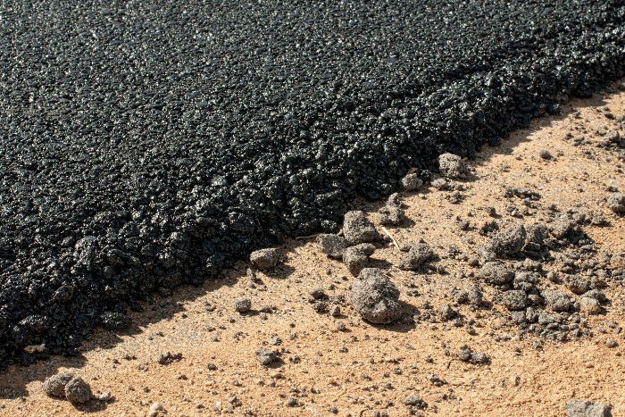 Asphalt is a mixture of dark bituminous pitch and sand or gravel