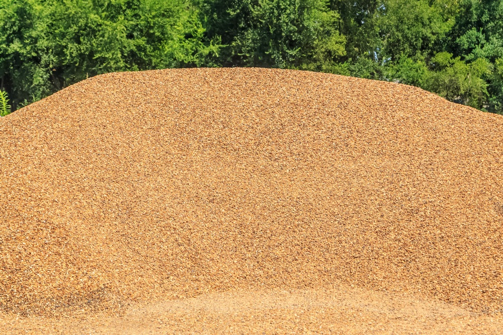Pea gravel mound for playgrounds
